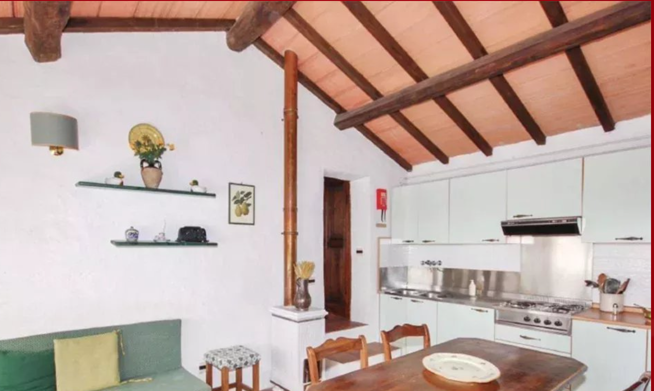 Stay Bright kitchen under a sloping beamed ceiling