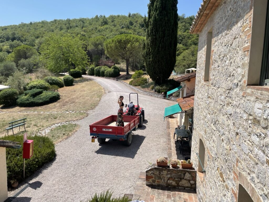 Roeland and Racheda on the red tractor on the estate