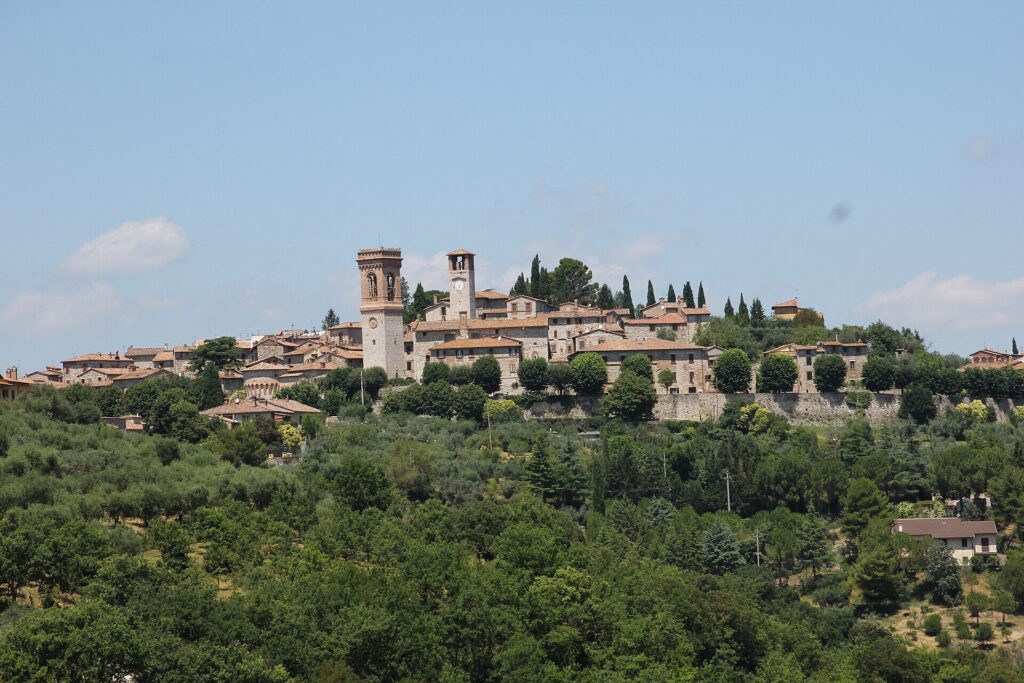 Corciano on its hill, surrounded by greenery