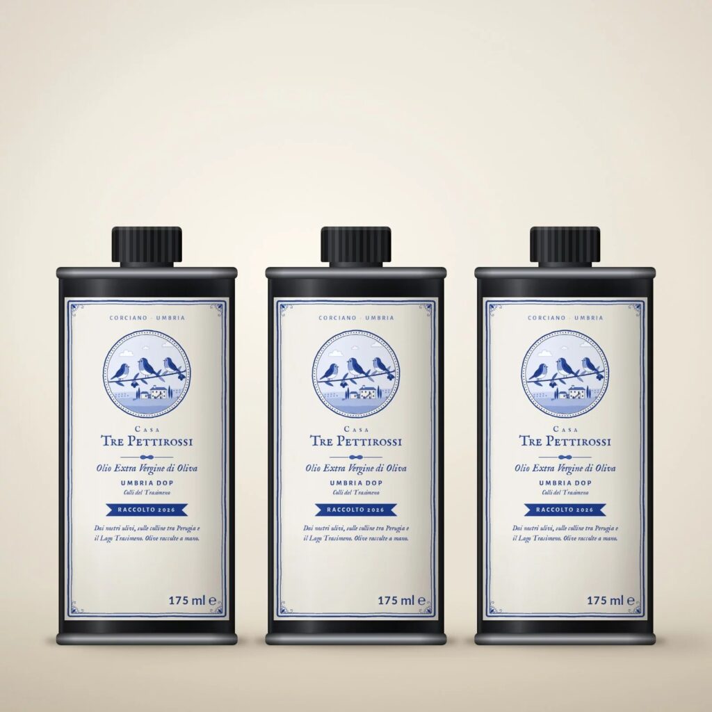 Three 175 ml tins of extra virgin olive oil with the Casa Tre Pettirossi label